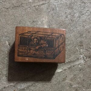 Wooden Stamp with Man Trying to Escape Chest Design